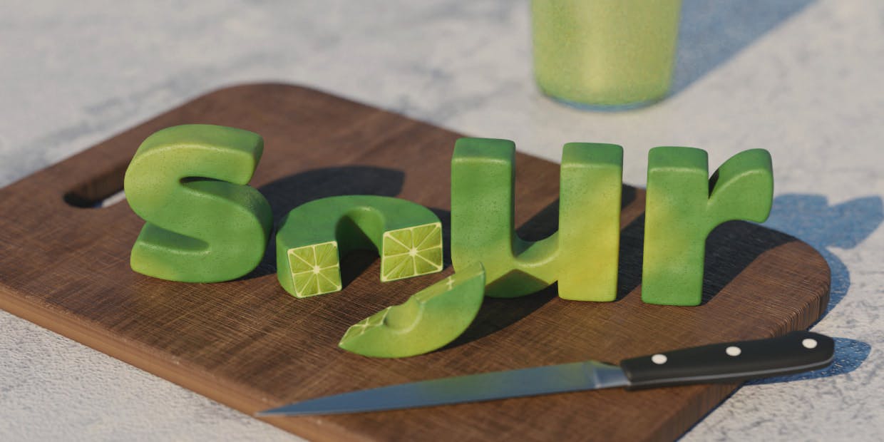 limes in the shapes of letters from the word 'sour' sit atop a cutting board with a knife on it. the 'O' is cut in half to reveal the "lime" wedges within.