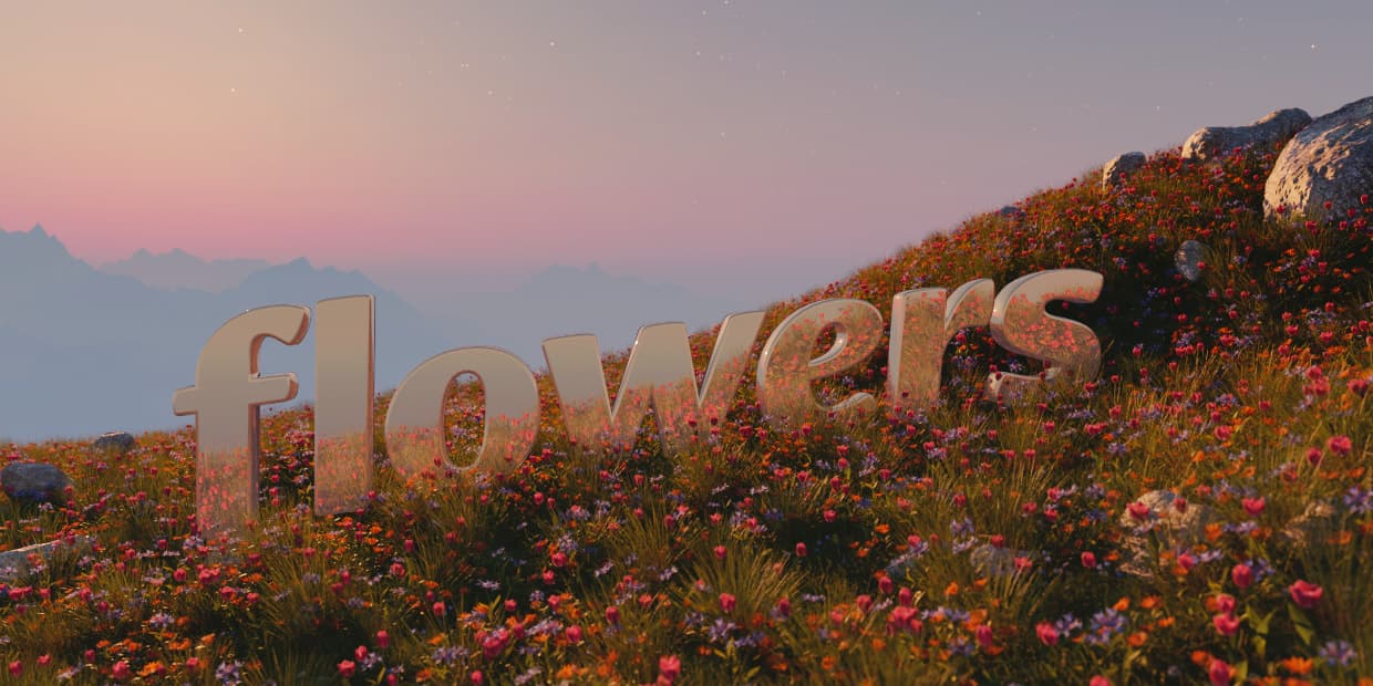 a 3d render of a flower field atop a mountain. in the background, a hazy mountain range is visible. amidst the field is the word 'flowers' in golden metal, reflecting the plants around it.